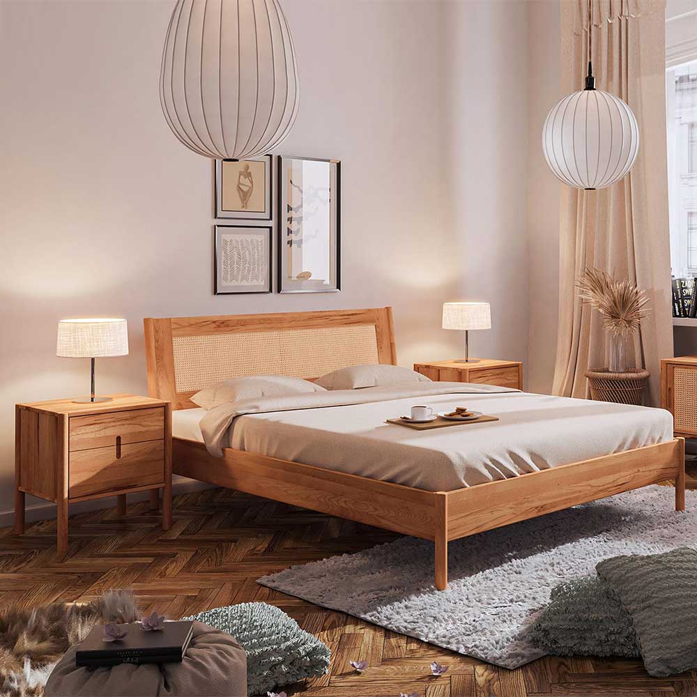 Echtholzbett Artjes aus Wildbuche Massivholz und Rattan