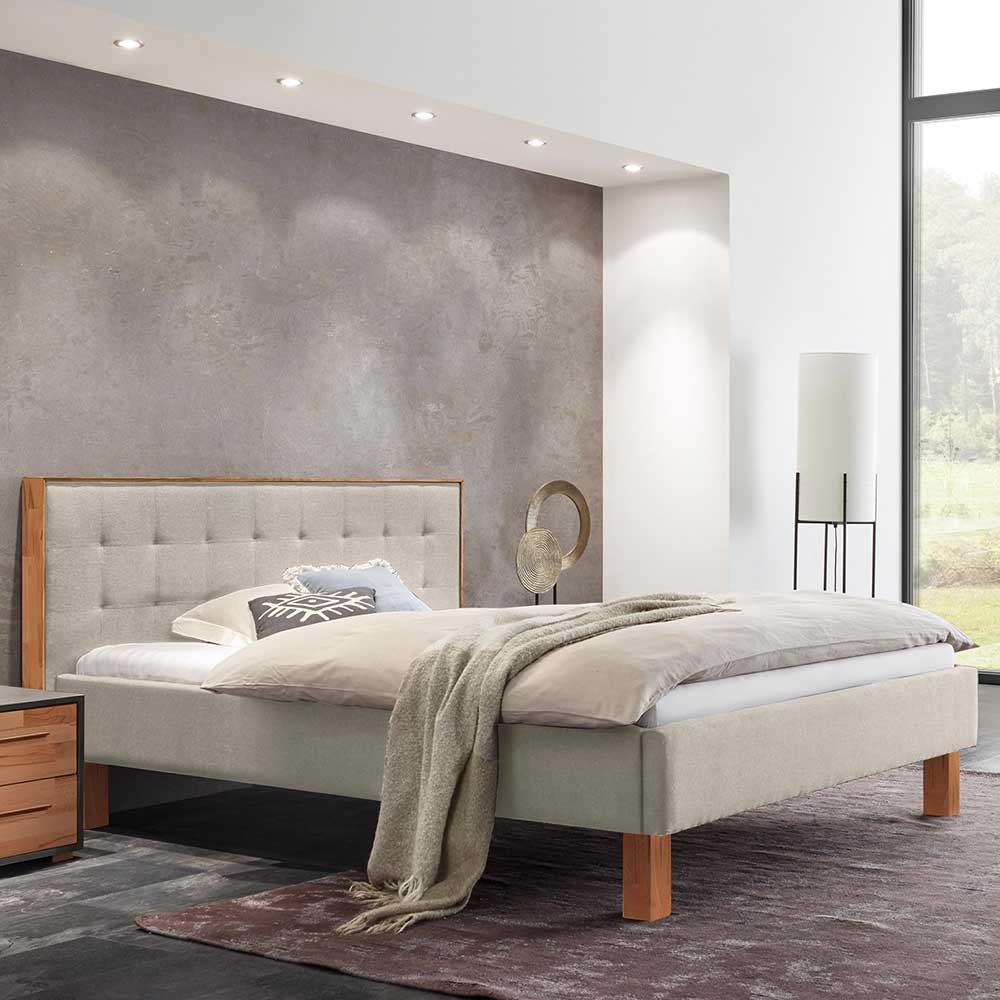 Polsterbett Rock in Beige mit Vierfußgestell aus Kernbuche