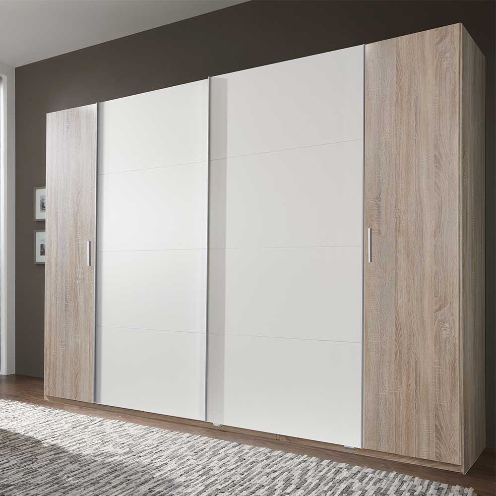 Schlafzimmerschrank Coriba in Eiche Sägerau und Weiß mit Dreh- und Schiebetüren