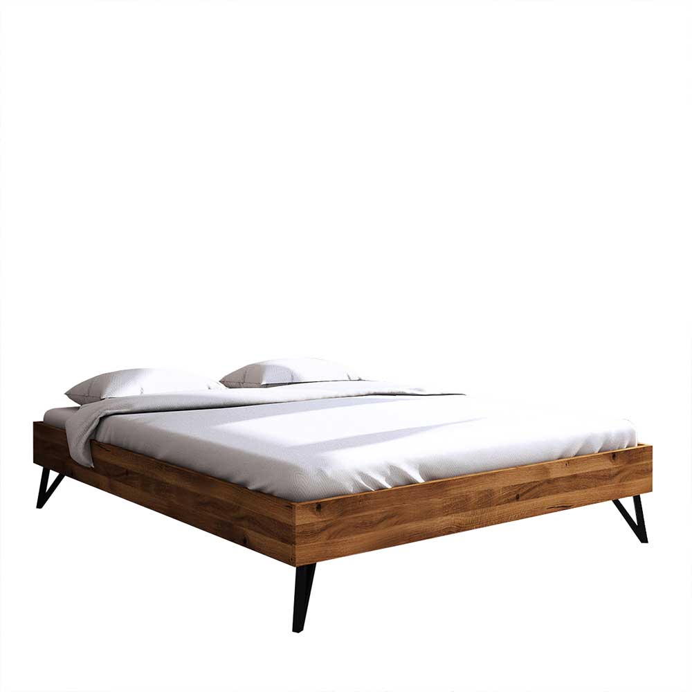 Bett Cariasca aus Wildeiche Massivholz und Stahl ohne Kopfteil