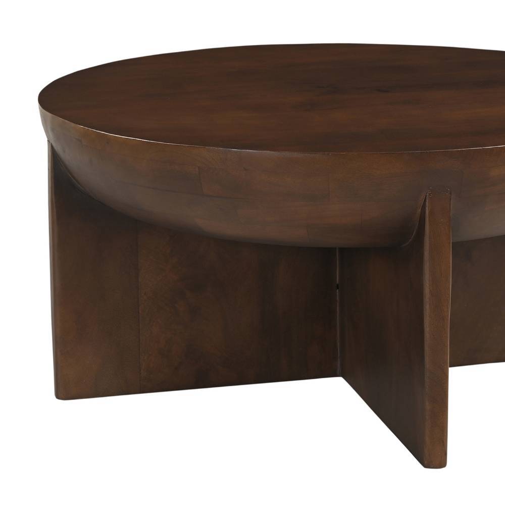 Sofatisch Iloca in runder Form aus Mangobaum Massivholz
