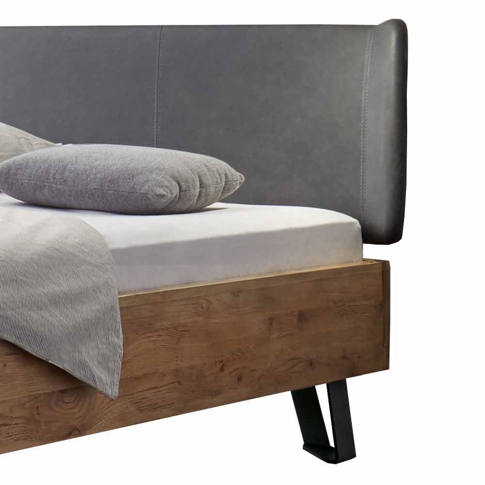 Holzbett Planet aus Wildeiche Massivholz mit Polsterkopfteil in Grau