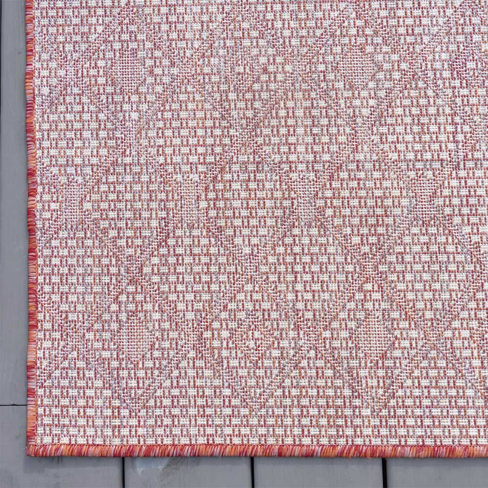 Kunststoff Teppich Giralna in Rostrot und Cremefarben mit geometrischem Muster