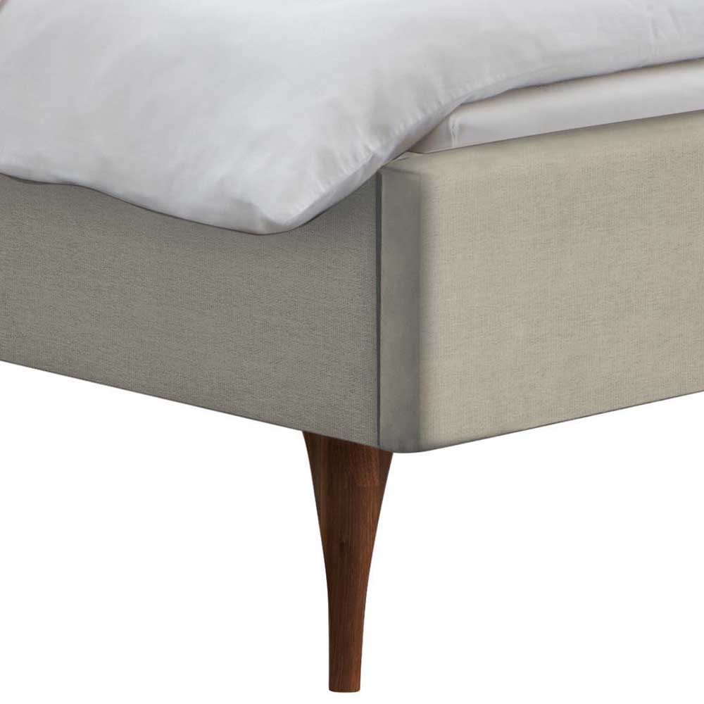 Polsterbett Beige Nava mit Vierfußgestell aus Holz in Nussbaumfarben