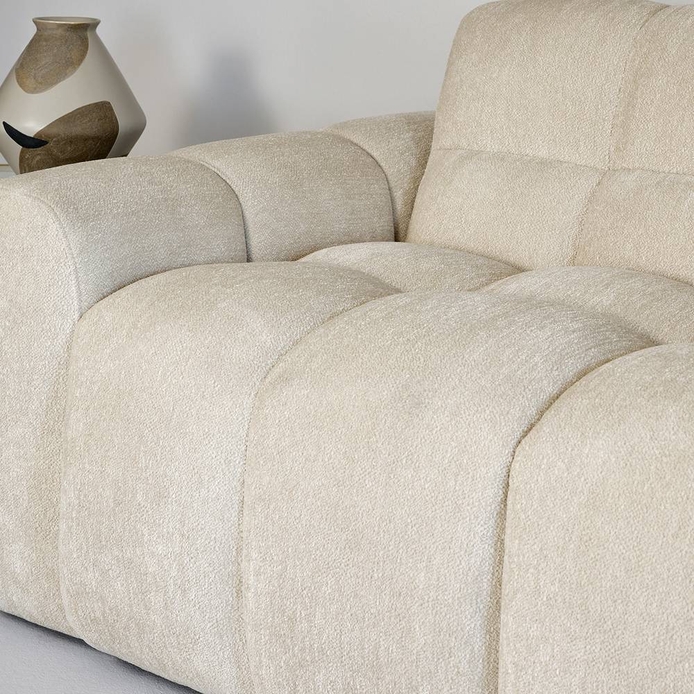 Ecksofa Freshing aus Boucle mit aufwendigen Steppungen