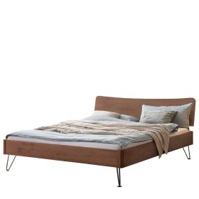Nussbaum Massivholz Bett Stufanias mit Vierfußgestell aus Metall 140x200 – Ansicht 1